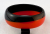 LG77 red orange/black diagonal lucite bangle